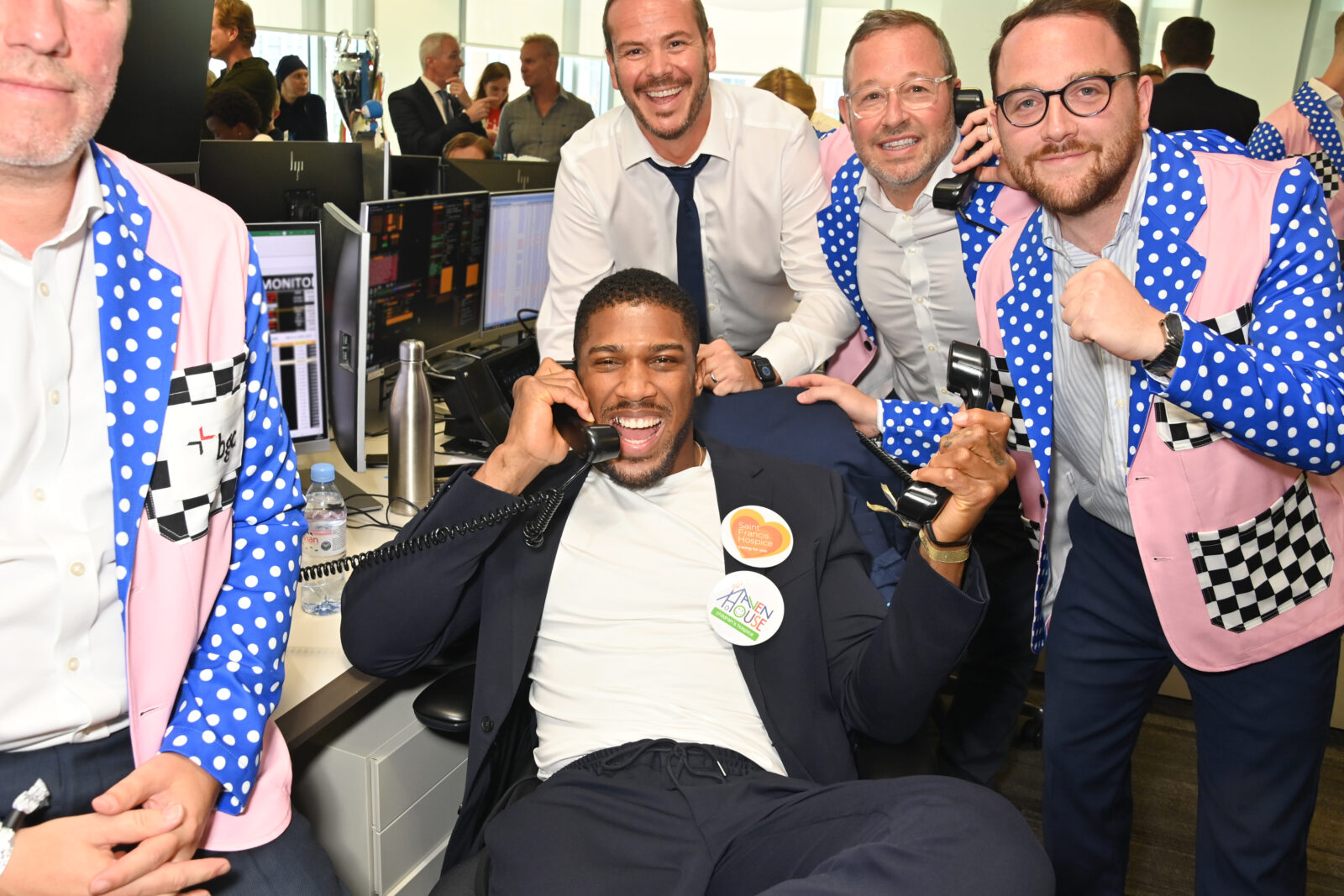 LONDON, ENGLAND - SEPTEMBER 11: Anthony Joshua (C) attends the BGC Group Charity Day on behalf of Haven House Children's Hospice, raising millions for good causes in memory of BGC's colleagues lost on 9/11, on September 11, 2023 in London, England. Pic Credit: Dave Benett