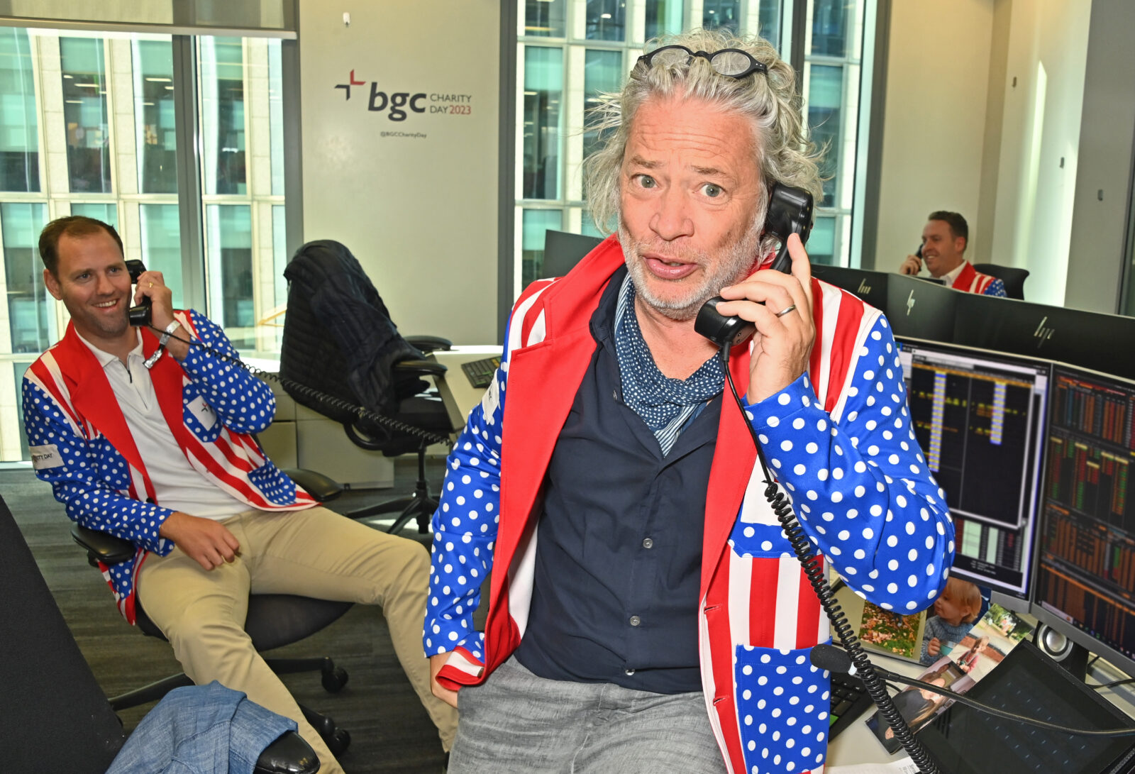 LONDON, ENGLAND - SEPTEMBER 11: Dexter Fletcher (R) and a BGC trader attend the BGC Group Charity Day on behalf of Mayor's Fund For London , raising millions for good causes in memory of BGC's colleagues lost on 9/11, on September 11, 2023 in London, England. Pic Credit: Dave Benett