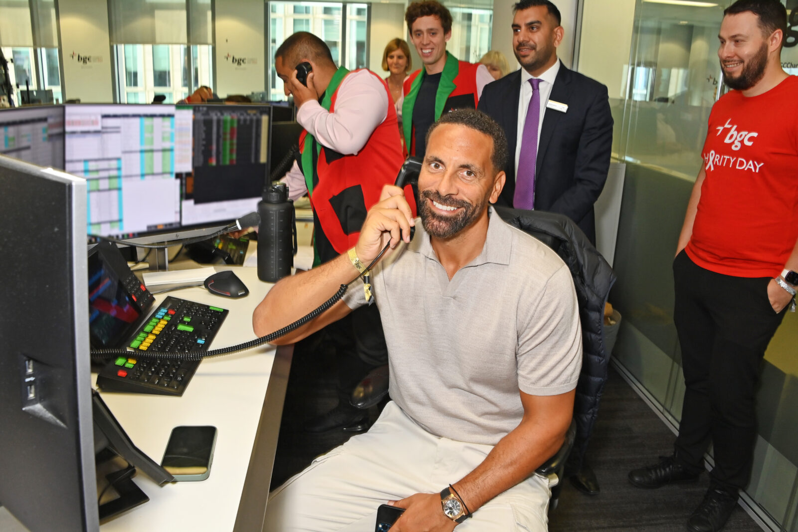 LONDON, ENGLAND - SEPTEMBER 11: Rio Ferdinand (C) attends the BGC Group Charity Day on behalf of Wellbeing of Women, raising millions for good causes in memory of BGC's colleagues lost on 9/11, on September 11, 2023 in London, England. Pic Credit: Dave Benett
